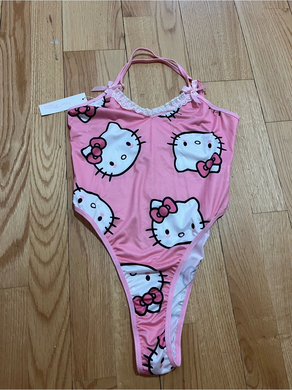Hello Kitty Pink Graphic Bodysuit with Bow Accent